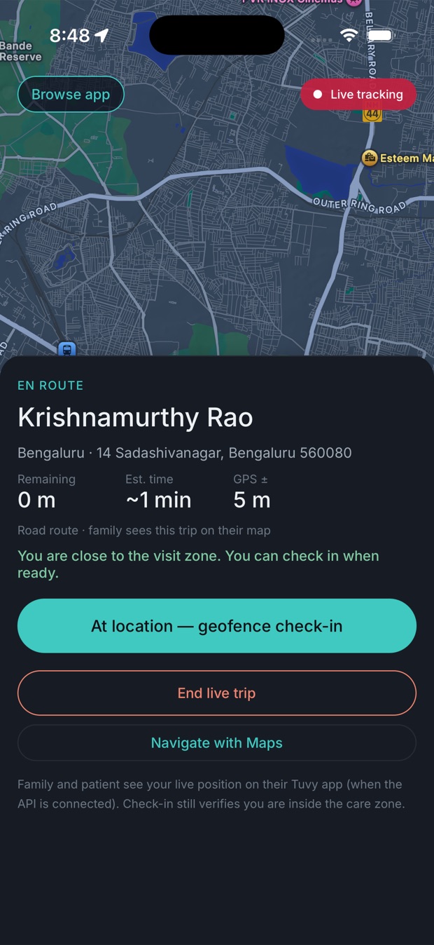 The caregiver's app en route: a live map of Bengaluru, distance remaining and a geofence check-in button.